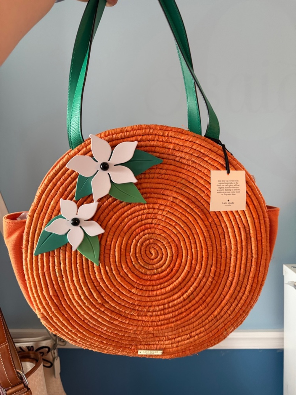 kate spade Orange Round Straw Tote with Green Handles and White Floral Appliqués